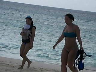 Spying on a curvy teen bikini babe